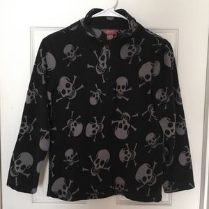 Fleece pullover with skull and crossbones.